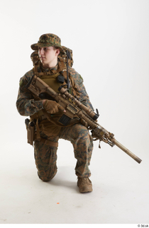 Photos Casey Schneider Trooper Pose 3 holding gun kneeling whole…